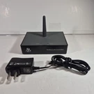 Acoustic Research - AW825 Wireless Audio Transmitter + Adapter. Fixed Price $25.00.
