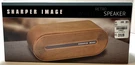 Sharper Image 1009301 Bluetooth Speaker Halfpipe Wood Design, Wireless, Aux-in. Fixed Price $99.99.