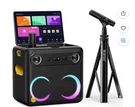 Ikarao Karaoke Machine With Lyrics Display, 32GB Tablet, Mics, 300W Speaker. Fixed Price $399.99.