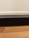 Sonos Beam GEN2 Black Speaker With Dolby Atmos Wall Mount Bracket. Fixed Price $495.00.