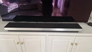 Bang & Olufsen Beosound Stage Dolby Atmos Soundbar Natural Aluminum/black. Fixed Price $1800.00.