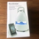 Brookstone Wireless Outdoor Weather Resistant Speaker 150' Range With Dock, Box. Fixed Price $79.99.