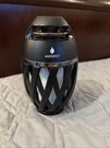 Anerimst Led Flickering A1 Flame Atmosphere Portable Speaker System. Fixed Price $19.99.