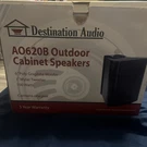 Destination Audio AO602B Outdoor Cabinet Speakers Pair New Open Box 100W. Fixed Price $44.99.