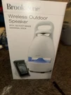 Brookstone Wireless Outdoor Weather Resistant Speaker 150' Range With Dock, Box. Fixed Price $120.00.