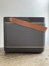 Bang & Olufsen Beolit 12 Wireless Speaker Gray With Leather Strap As Is. Fixed Price $250.00.