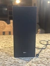 Lg Wireless Active Subwoofer SPL5B-W. Fixed Price $21.00.